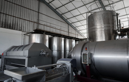 Modern wine factory interior with reservoirs.