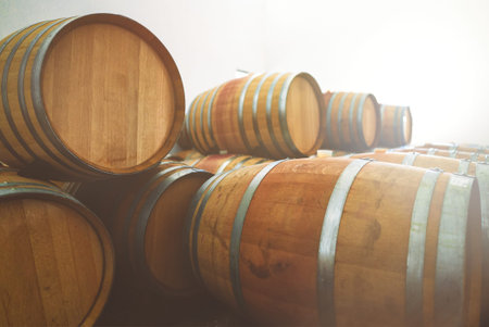 Wine barrels stacked in the cellar.