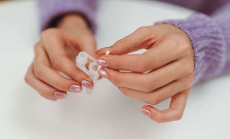 Teenager doing express antigen test.の写真素材