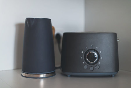 Modern kettle and toaster in the kitchen.の写真素材