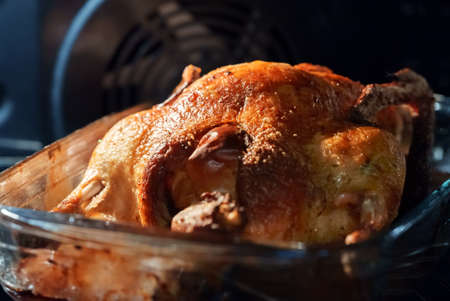 Roasted duck with apples in the oven.の写真素材