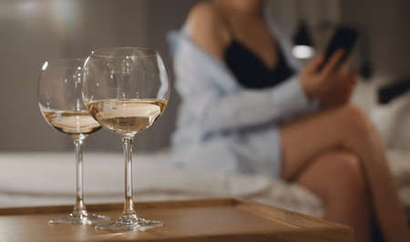 Woman sends erotic photos while waiting for a date.の写真素材