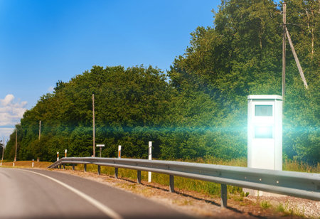 Modern speed camera on the freeway.