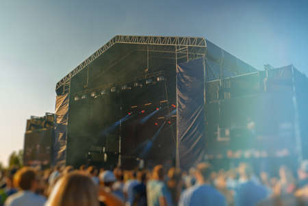 Musical band performing live on the stage. Blurred image.の写真素材