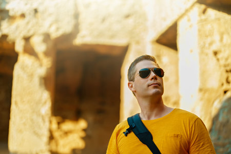 Man visiting Tombs of the Kings in Paphos.