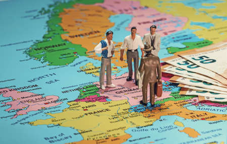 Business people meeting concept. Figurines of men on the map of Europe.の写真素材