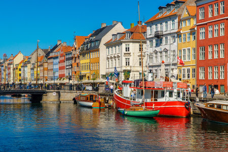 Copenhagen, Denmark - 08.05.2022: Famous Nyhavn canal with colorful houses.のeditorial素材