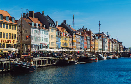 Copenhagen, Denmark - 08.05.2022: Famous Nyhavn canal with colorful houses.