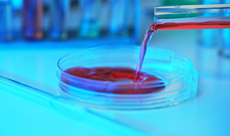 Close up shot of Petri dish with test tube.