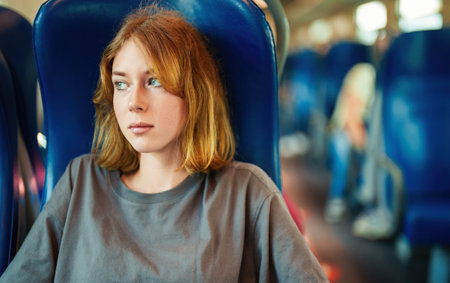 Teenage girl travelling inside the train.の写真素材