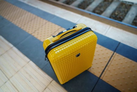 Forgotten travel bag on the train station.の写真素材