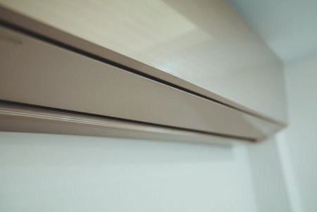 Air conditioner inverter mounted on the wall.