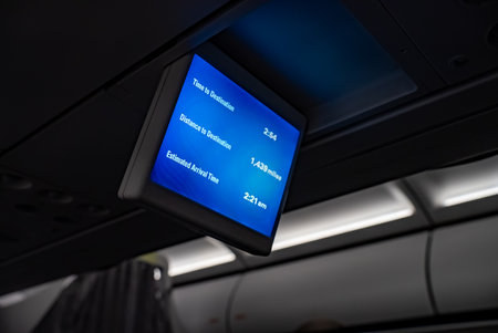 Monitor on the plane shows how much time is left to fly to your destination.の写真素材