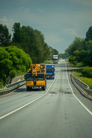 Big crane truck on the road.