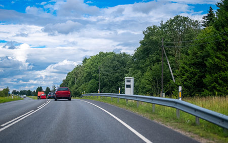 Modern speed camera on the freeway.