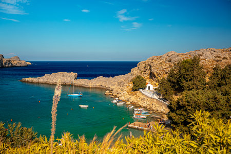Boats in St. Paul's Bay in Rhodes in Greece.の写真素材