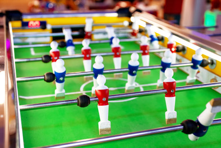 Table football game with red and blue players