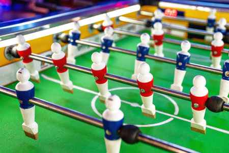Table football game with red and blue players