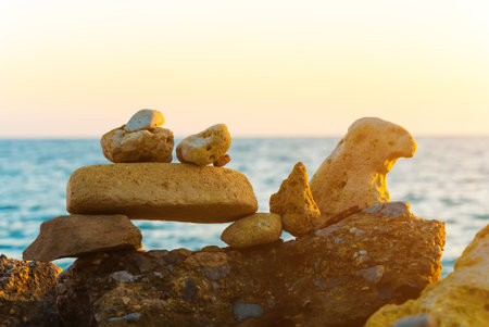 Many ZEN stones on the sunset beach.