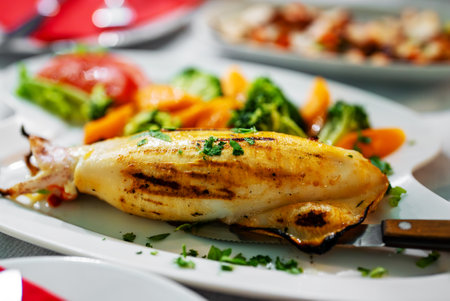 Squid stuffed with cheese and vegetables.の写真素材