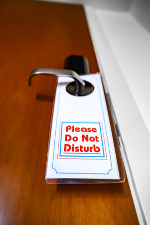 Do not disturb sign on the door.の写真素材