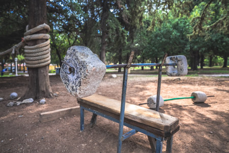 Improvised outdoor gym. Barbell made of reinforcement and concrete.の写真素材