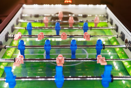 Table football game with white and blue players.の写真素材
