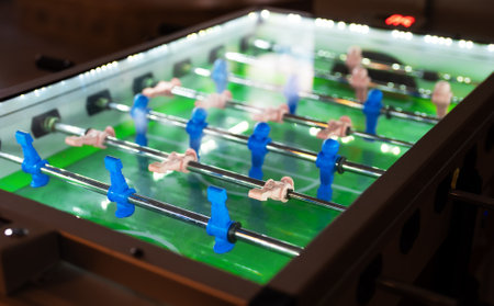 Table football game with white and blue players.の写真素材