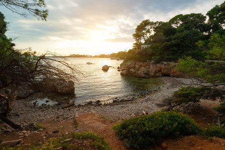 Wild beach in the Bay of Antibes Billionaires.