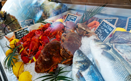 Freshly caught seafood on ice at the market.の写真素材