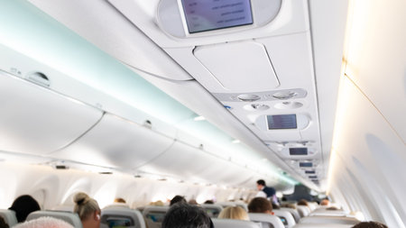 Interior inside of the plane with passengers.の写真素材