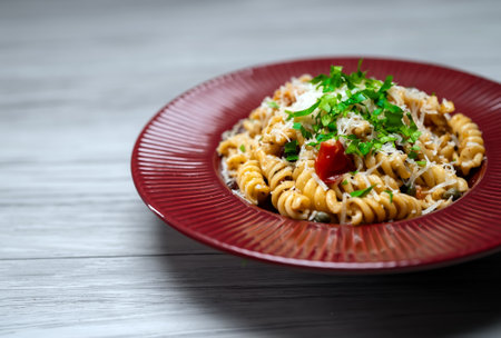 Freshly Cooked Pasta alla Puttanesca Served on Table.の写真素材