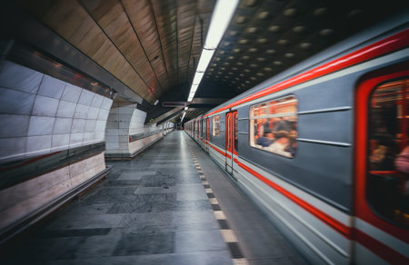 Interior view of Prague metro station with train arriving.の写真素材