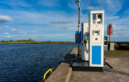 Boat fuel station with gasoline and diesel pumps.の写真素材