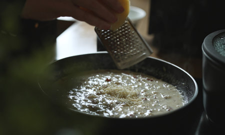 Creamy Sauce Cooking on Pan.の写真素材