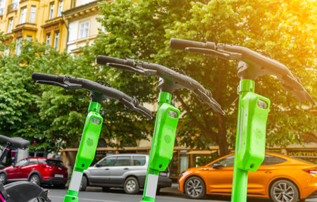 Electric Scooters Available for Rent on City Street.の写真素材