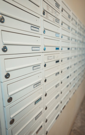 Mailboxes with a lock in an apartment building.の写真素材
