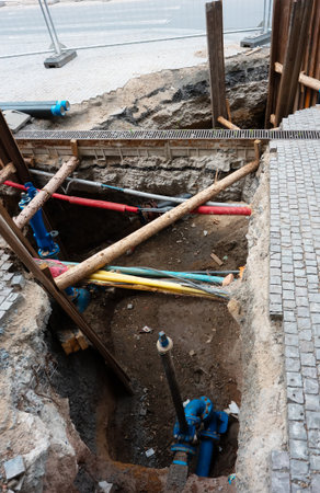 Trench excavated for urban utility pipe repair.の写真素材