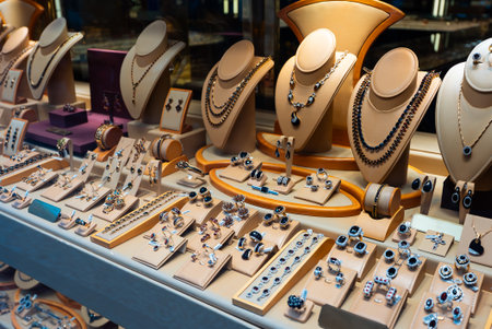 Luxury jewelry display with necklaces and rings.の写真素材