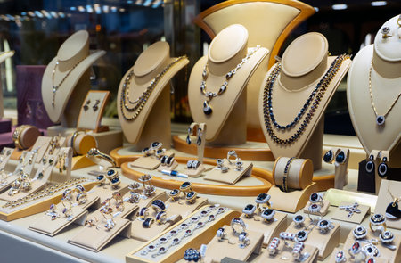 Luxury jewelry display with necklaces and rings.の写真素材