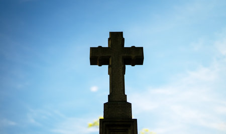 Memorial stone cross in the forest cemetery.