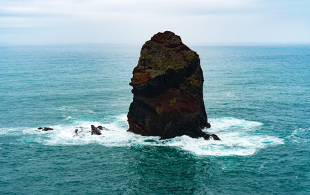 Tall volcanic sea stacks in Madeira Portugal.