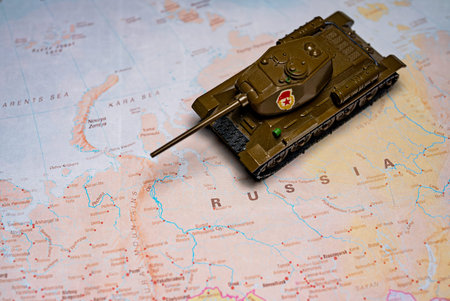 Toy tank model on map of Russia.