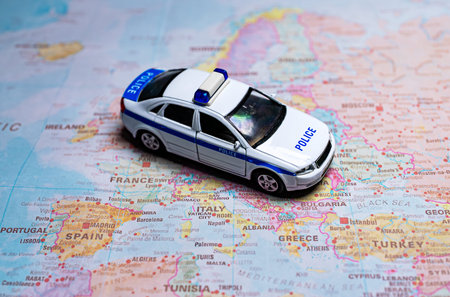 Police car model on map of Europe.