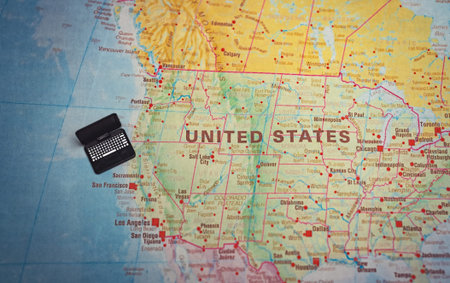 Miniature laptop on USA map AI technology concept.