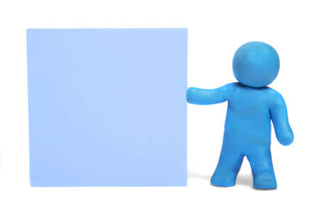 Plasticine human figures on a white backgroundの写真素材