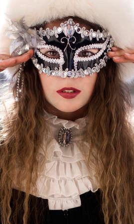 girl on the balcony of the maskの写真素材