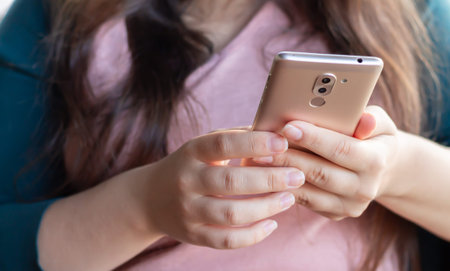 Woman using smartphone for work or fun