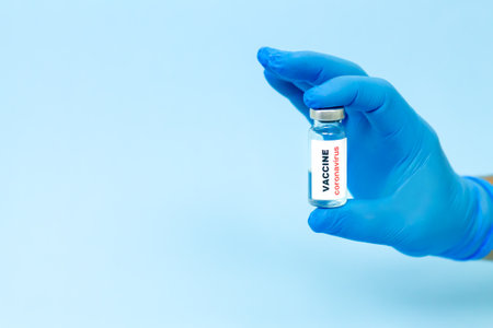 Coronavirus or COVID-19 vaccine. Doctor holding vaccine against corona virus for prevent infection. Healthcare and medicine conceptの写真素材