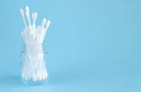 White cotton swabs or buds for personal hygiene in glass jarの写真素材